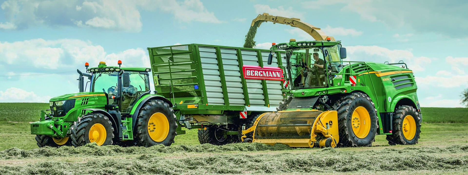 bergmann slage trailer with John Deere forage harvester grass silage harvest