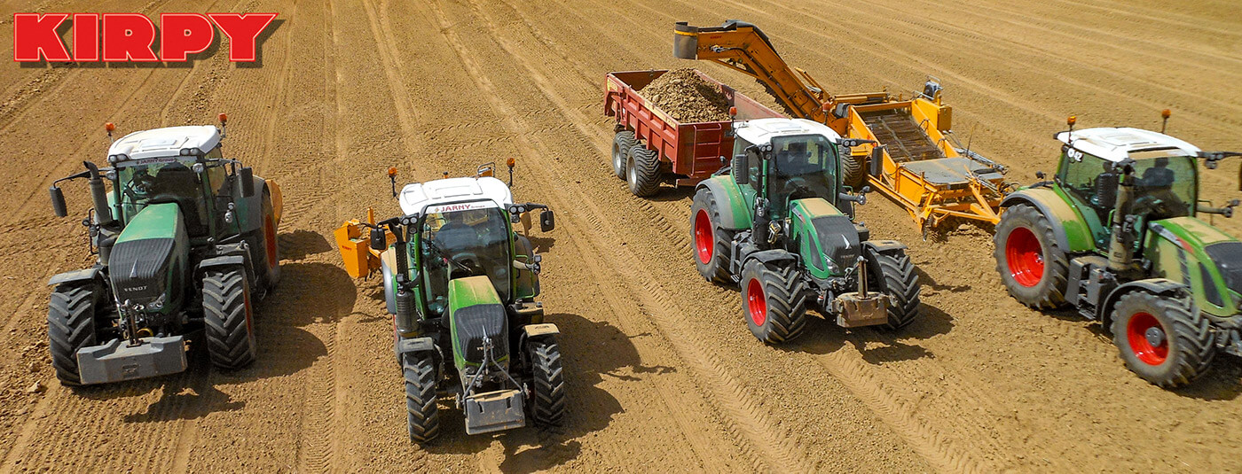 Kirpy stone pickers working in field with stone rake and Kirpy crusher